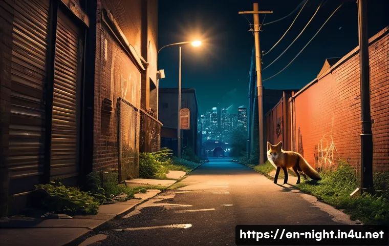 야경과 도심 속 야생 동물 - A nocturnal urban scene featuring a red fox cautiously navigating a dimly lit alleyway at night, its...
